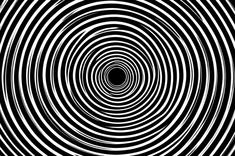 Black and white concentric rings pattern that appears to vibrate and pulse toward the centre