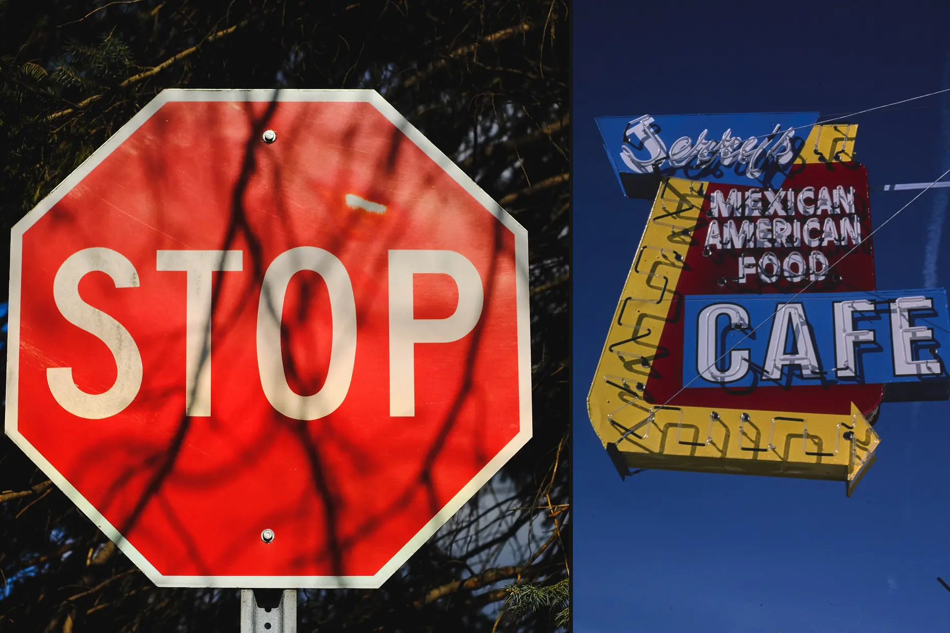A red stop sign beside a red, yellow and blue neon cafe sign against a deep blue sky